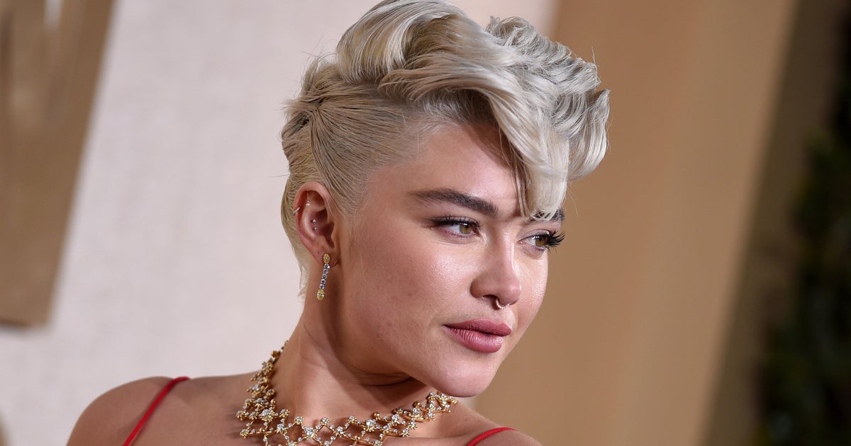 NextImg:Florence Pugh Continues Her Signature See-Through Trend With Daring Golden Globes Look
