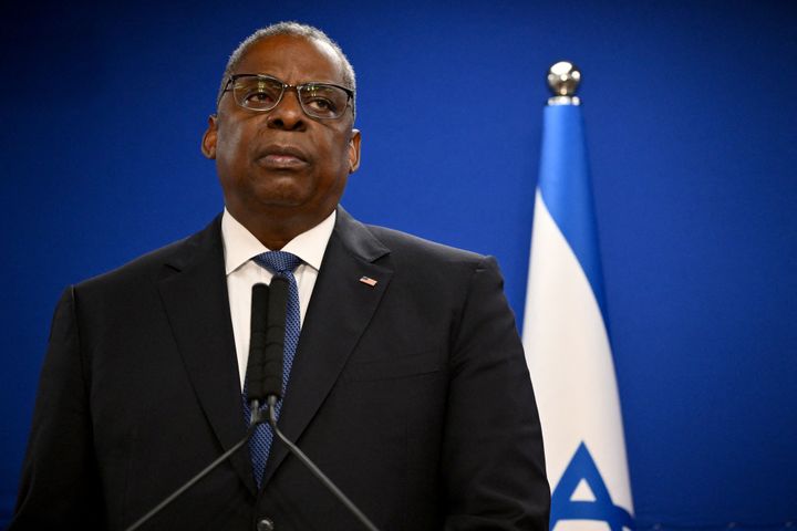 Defense Secretary Lloyd Austin looks on during a joint press conference with Israel's defense minister, in Tel Aviv, Israel, on Dec.18, 2023.