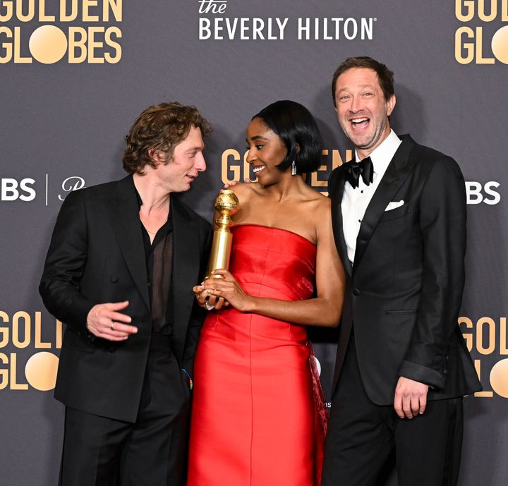 Actors Jeremy Allen White, Ayo Edebiri and Ebon Moss-Bachrach join backstage after "The Bear" wins a Golden Globe for best TV series on Sunday.