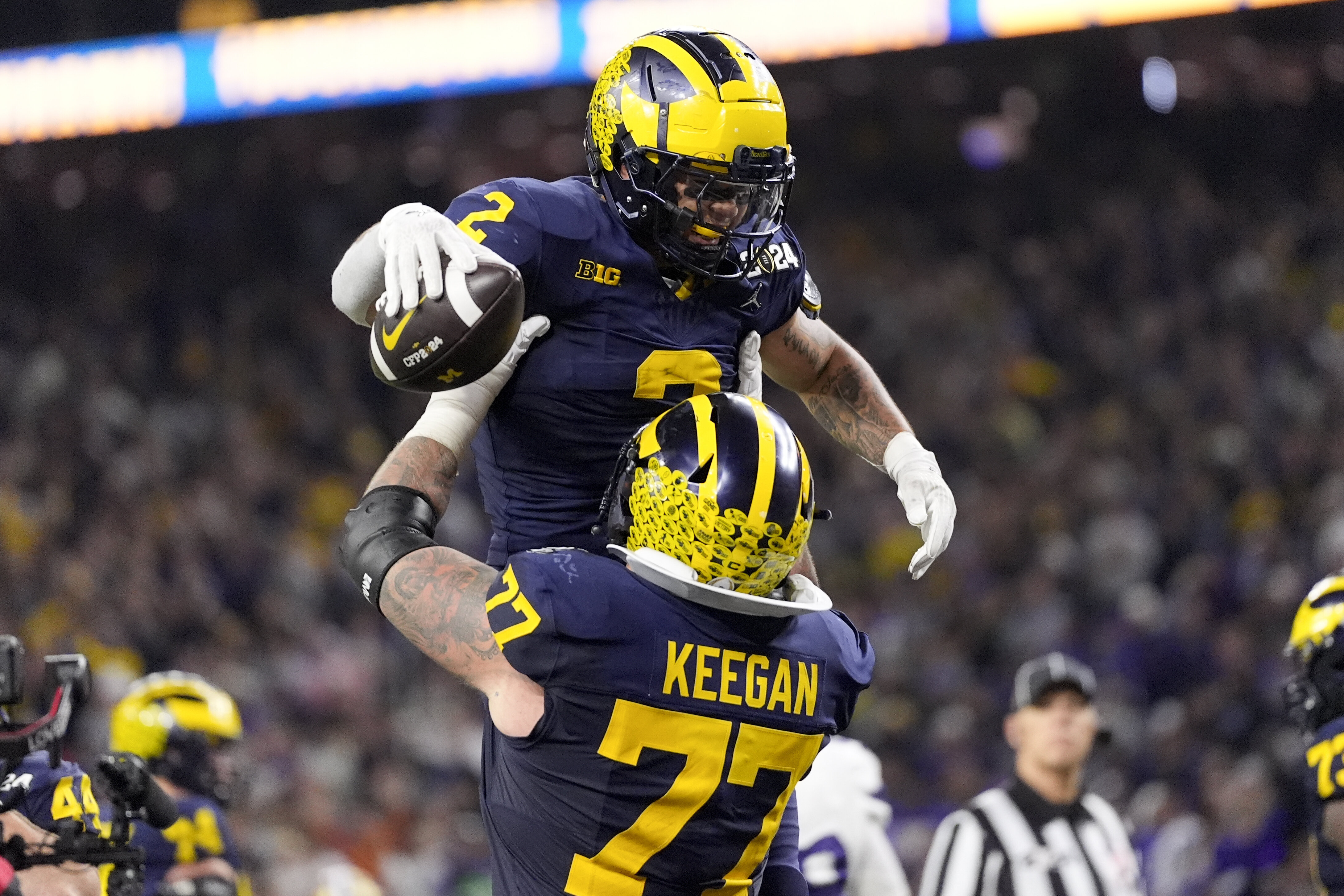 Michigan Wolverines Overpower Washington Huskies 34-13 For National ...