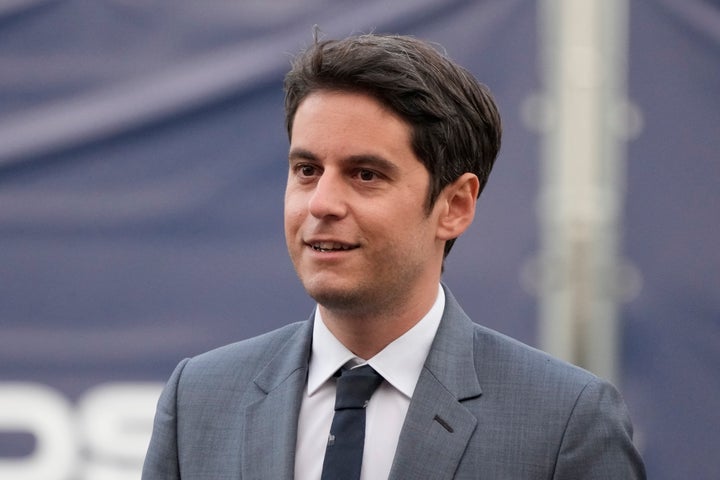 Then government spokesperson Gabriel Attal arrives at a television recording studio on April 20, 2022, in La Plaine-Saint-Denis, outside Paris.