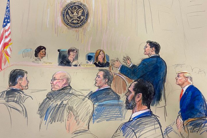 This artist sketch depicts former President Donald Trump, seated right, listening as his attorney John Sauer, standing, speaks before the D.C. Circuit Court of Appeals at the federal courthouse, Tuesday, Jan. 9, in Washington, D.C.