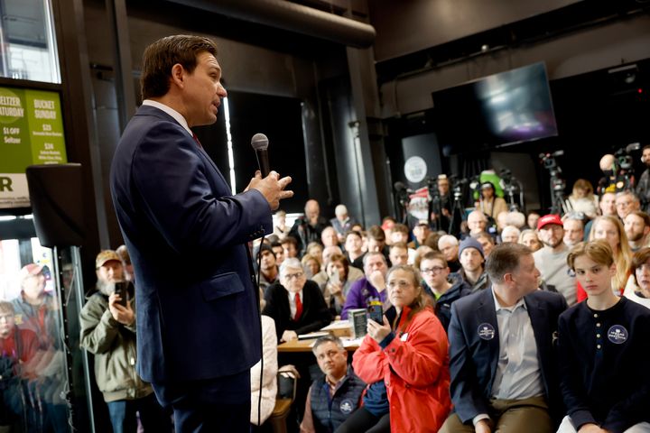 Florida Gov. Ron DeSantis campaigns in Grimes, Iowa, on Monday. He is following Donald Trump's lead by casting himself as a defender of Social Security.