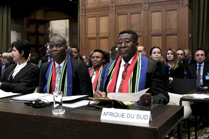 Ambassador of the Republic of South Africa to the Netherlands Vusimuzi Madonsela, right, and Minister of Justice and Correctional Services of South Africa Ronald Lamola, centre