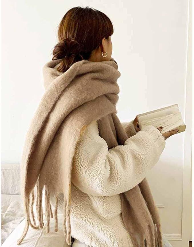 A delightfully ginormous super soft oversize scarf designed to feel just like cashmere