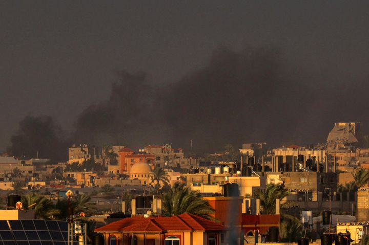 A picture taken from Rafah shows smoke billowing over Khan Yunis in the southern Gaza Strip during Israeli bombardment on Jan. 11.