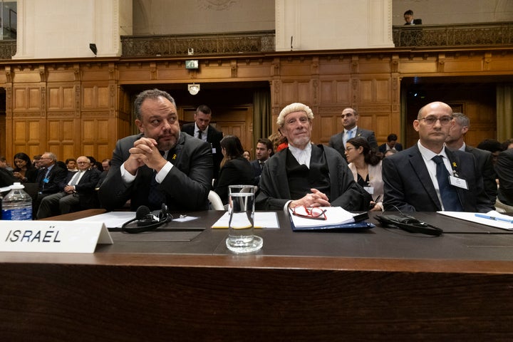 THE HAGUE, NETHERLANDS - JANUARY 12: (L-R) Israeli legal counsellor Tal Becker, barrister Malcolm Shaw, and Gilad Noam wait for today's hearings of Israel's point of view as South Africa has requested the International Court of Justice to indicate measures concerning alleged violations of human rights by Israel in the Gaza Strip on January 12, 2024 in The Hague, Netherlands. (Photo by Michel Porro/Getty Images)