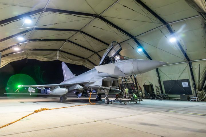 AKROTIRI, CYPRUS - JANUARY 12: In this handout image provided by the UK Ministry of Defence, an RAF Typhoon aircraft returns to berth following a strike mission on Yemen's Houthi rebels at RAF Akrotiri on January 12, 2024 in Akrotiri, Cyprus. (Photo by MoD Crown Copyright via Getty Images)