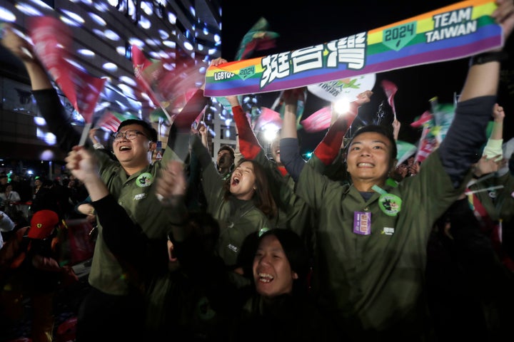Supporters of Taiwan's 2024 presidential election candidate, Taiwan vice president Lai Ching-te, also known as William Lai, cheer after Lai's victory, in Taipei, Taiwan, Saturday, Jan. 13, 2024. Ruling-party candidate Lai Ching-te has emerged victorious in Taiwan’s presidential election and his opponents have conceded. The result in Taiwan’s presidential and parliamentary election will chart the trajectory of relations with China over the next four years. (AP Photo/Chiang Ying-ying)
