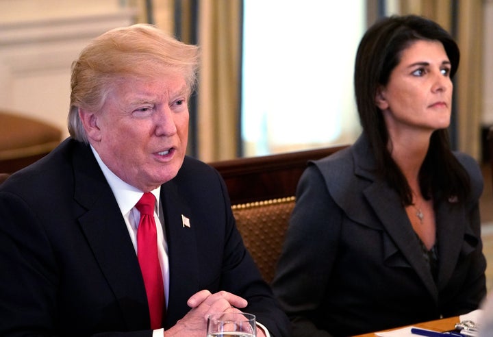 Then-President Donald Trump speaks as Nikki Haley, then-U.S. Ambassador to the United Nations, looks on. Haley is now his top rival in the GOP presidential primary.