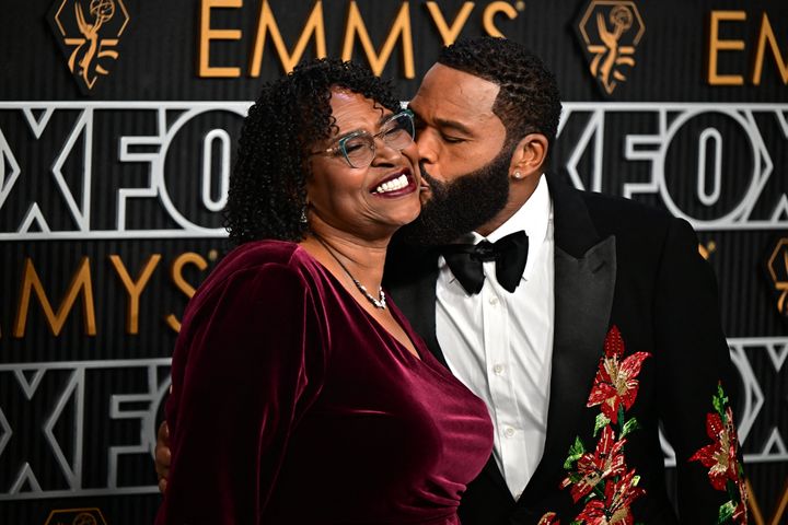 Host Anthony Anderson and his mom, Doris Hancox, on Monday at the 75th Emmy Awards at the Peacock Theater in Los Angeles.