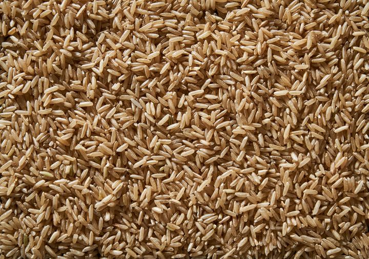Raw whole rice background.
