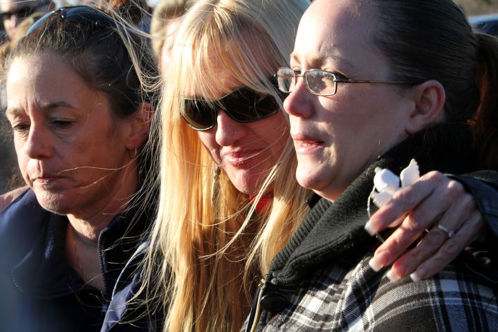 Lorraine Ela, left, mother of Megan Waterman, Mary Gilbert, center, mother of Shannan Gilbert, and Melissa Cann, sister of Maureen Brainerd-Barnes speak to reporters in 2011 after Gilbert's body was found.