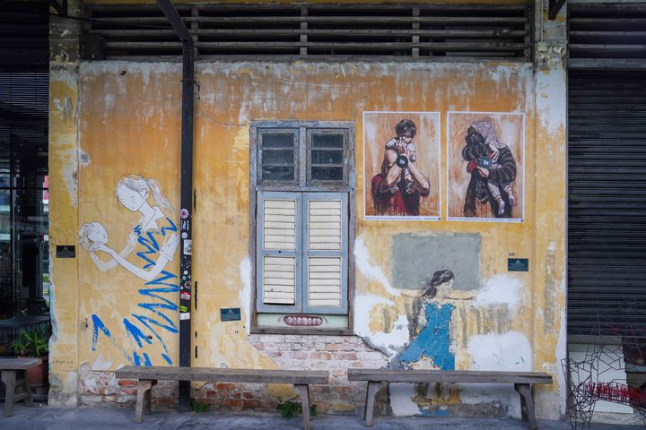 Images that were taken by Belal Khaled were reimagined by street artist Ernest Zacharevic and are now on display in Penang, Malaysia.