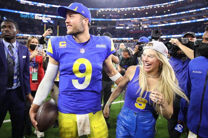 Matthew Stafford of the Los Angeles Rams and his wife, Kelly Stafford, after the Rams' defeat of the San Francisco 49ers in the NFC Championship Game in January 2022.