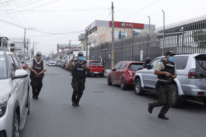 Police respond to an attack at the TC Television network, a public television channel in Guayaquil, Ecuador, on Jan. 9.