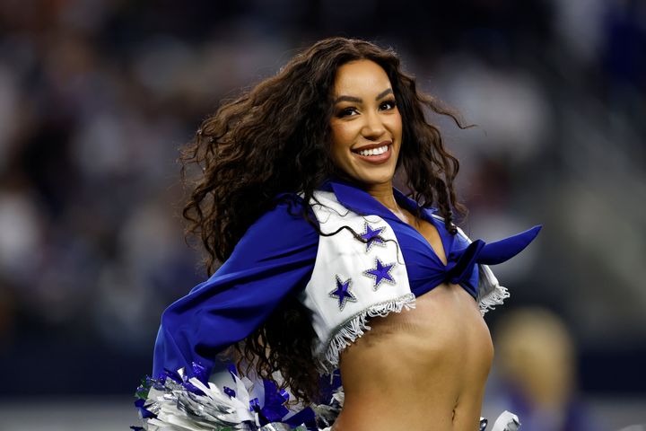 Darian Lassiter of the Dallas Cowboys Cheerleaders performs during a football game against the New York Giants on Nov. 12, 2023, in Arlington, Texas.