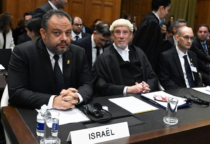 Israeli Foreign Ministry Legal Counsel Tal Becker (L) attends the hearing of Israel's defense at the International Court of Justice (ICJ) against South Africa's genocide case in Gaza against Israel on January 12, 2024, in the Hague, Netherlands. On day one of the trial, South Africa presented hard evidence in the case it filed on Dec. 29, accusing Israel of genocide and violations of the UN Genocide Convention with its actions in the Gaza Strip since Oct. 7. 