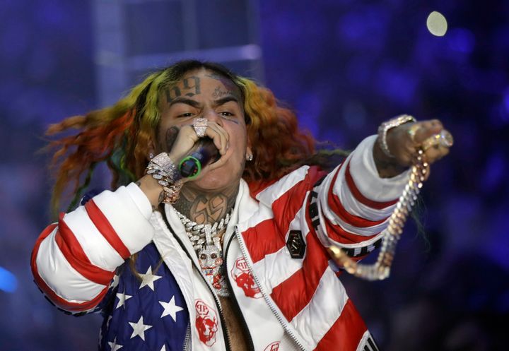 FILE - Rapper Daniel Hernandez, known as Tekashi 6ix9ine, performs during the Philipp Plein women's 2019 Spring-Summer collection at Fashion Week in Milan, Italy, Sept. 21, 2018. Authorities in the Dominican Republic have arrested the rapper, who is scheduled to appear in court on Jan. 18, 2024 on charges of domestic violence, and is being held at a jail in the capital, Santo Domingo, where he was arrested Jan. 17, according to officials. (AP Photo/Luca Bruno, File)