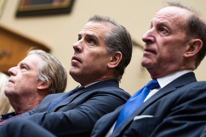 Hunter Biden, flanked by attorneys Kevin Morris (left) and Abbe Lowell, attends the House Oversight Committee meeting on Jan. 10 that was held to find Hunter Biden in contempt for defying a closed-door deposition. Biden and his lawyers had offered to answer questions in a public hearing instead.