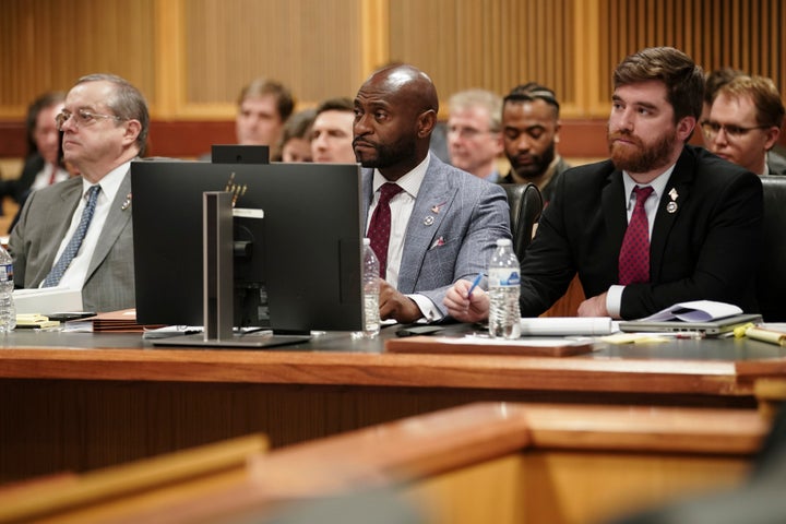 ATLANTA, GA - JANUARY 12: Special prosecutors John Floyd and Nathan Wade, and assistant district attorney Donald Wakeford listen to the judge during a motions hearing for former U.S. President Donald Trump's election interference case at the Lewis R. Slaton Courthouse on January 12, 2024 in Atlanta, Georgia. (Photo by Elijah Nouvelage-Pool/Getty Images)