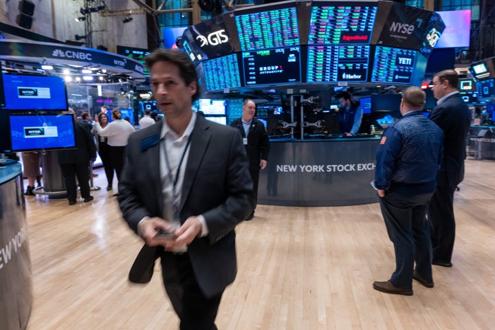 NEW YORK, NEW YORK - JANUARY 19: Traders work on the floor of the New York Stock Exchange (NYSE) on January 19, 2024 in New York City. Stocks closed up over 350 points while the S&P 500 closed at an all-time high on Friday. (Photo by Spencer Platt/Getty Images)