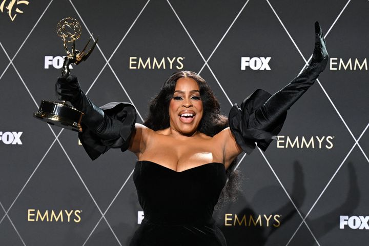 Niecy Nash-Betts poses in the press room during the 75th Emmy Awards at the Peacock Theatre at L.A.
