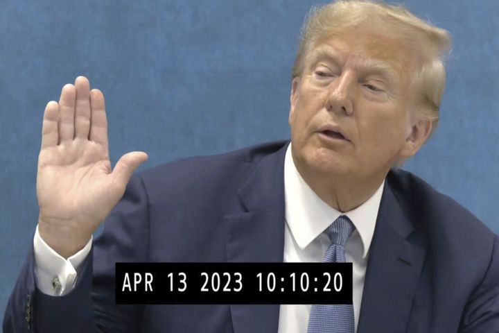 In this image taken from from video made public by the Office of the New York State Attorney General on Friday, Jan. 19, 2024, former President Donald Trump is sworn in for a deposition on April, 13, 2023, where the former president came face-to-face with the New York State Attorney General Letitia James at her Manhattan, New York Office. (Office of the New York State Attorney General via AP)