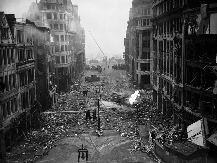 FILE - In this Sept. 10, 1940 file photo bomb damage from a Nazi air raid is seen on King William Street in the City of London. The United Kingdom has suffered its worst civilian loss of life since World War II by a significant number. Some 70,000 non-combatants perished in the 1940s. 75 years later, it's 100,000 taken by the coronavirus pandemic, an enemy no less relentless and fearsome and one whose defeat is still some time away. (AP Photo, File)