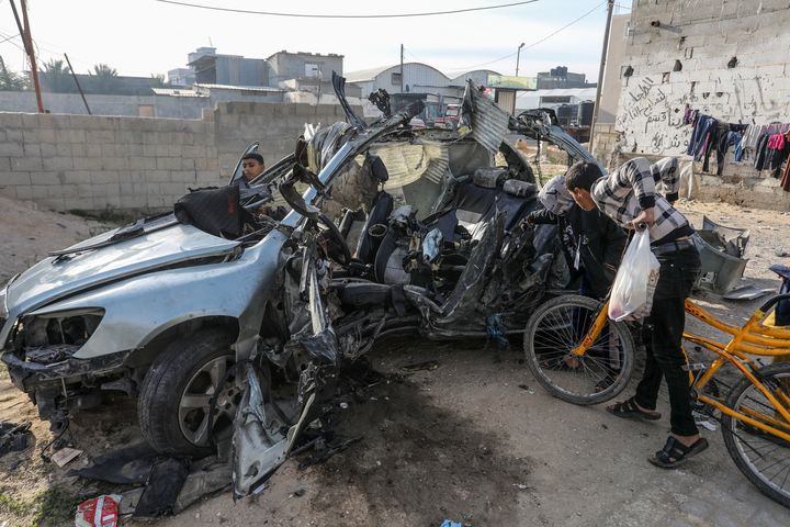 RAFAH, GAZA - JANUARY 21: A view of a wrecked vehicle is seen after Israeli drones conduct airstrike over Rafah, Gaza on January 21, 2024. (Photo by Abed Rahim Khatib/Anadolu via Getty Images)