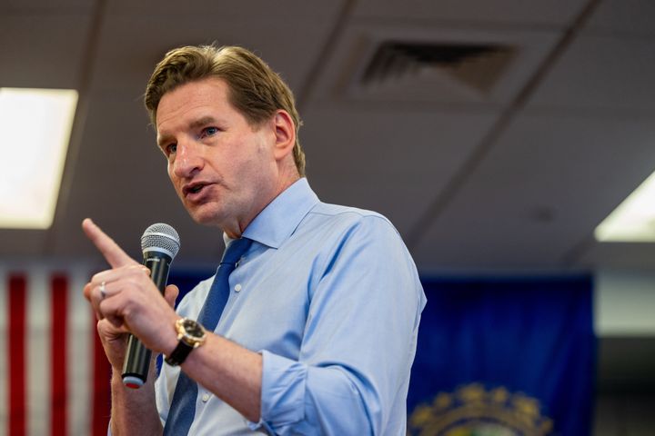 Rep. Dean Phillips (D-Minn.), seen here campaigning in Nashua on Saturday, is hoping to take advantage of President Joe Biden's absence from the ballot in New Hampshire.