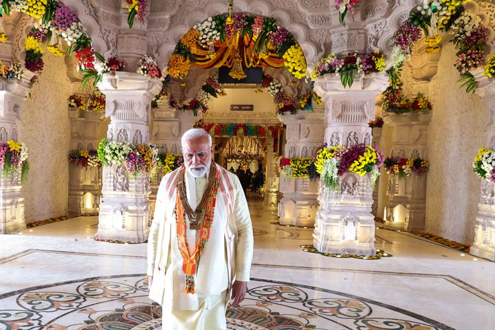 In this photograph released by Indian Government Press Information Bureau, Indian Prime Minister Narendra Modi walks after opening of a Hindu temple built on the ruins of a razed historic mosque in Ayodhya, India, Monday, Jan. 22, 2024.