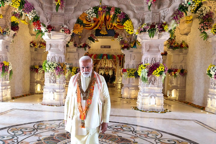 In this photograph released by Indian Government Press Information Bureau, Indian Prime Minister Narendra Modi walks after opening of a Hindu temple built on the ruins of a razed historic mosque in Ayodhya, India, Monday, Jan. 22, 2024.