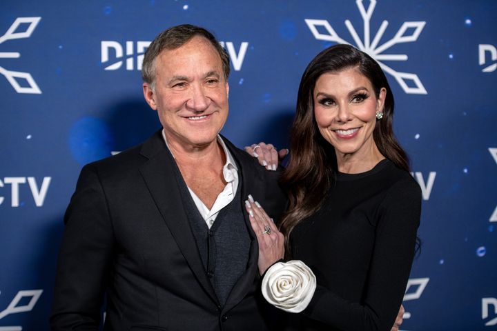 TV personalities Dr. Terry Dubrow (left) and Heather Dubrow attend the DIRECTV Celebrates Christmas At Kathy's event on Nov. 28, 2023, in Los Angeles.