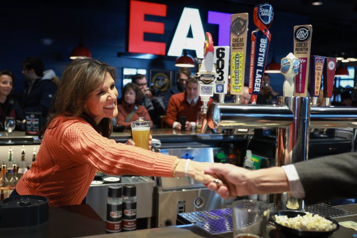 Republican presidential candidate, former U.N. Ambassador Nikki Haley, greets people during a campaign event on Monday in Concord, New Hampshire. Haley continues to campaign across New Hampshire ahead of the state's Jan. 23 primary. 