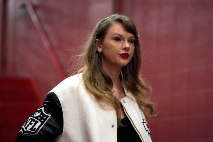 Taylor Swift enters Arrowhead Stadium before the start of an NFL football game between the Kansas City Chiefs and the Cincinnati Bengals on Dec. 31 in Kansas City.