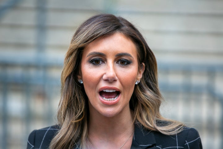 Donald Trump's lawyer, Alina Habba, speaks outside a New York City courthouse on Nov. 6, 2023. She was seen at a New Hampshire campaign party after requesting a delay in Trump's defamation trial due to feeling ill.