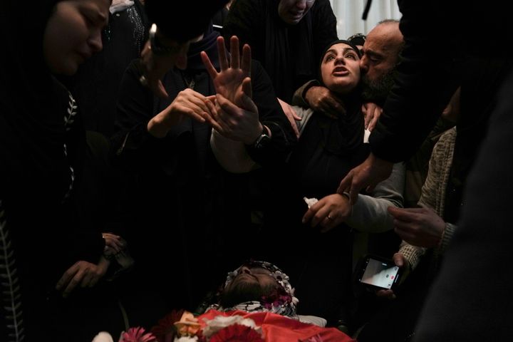 Relatives mourn 17-year-old American Tawfic Hafeth Abdeljabbar at his funeral in his family’s Palestinian home village in al-Mazra’a Al Sharqiya, West Bank, on Jan. 20. Abdeljabbar was killed Friday by Israeli fire, and police say they have launched an investigation.