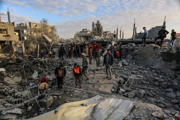 Civil defense teams and Palestinians continue their search and rescue operations after an Israeli attack on the Omar Bin Abdulaziz Mosque in Rafah, Gaza on January 24, 2024. (Photo by Abed Rahim Khatib/Anadolu via Getty Images)