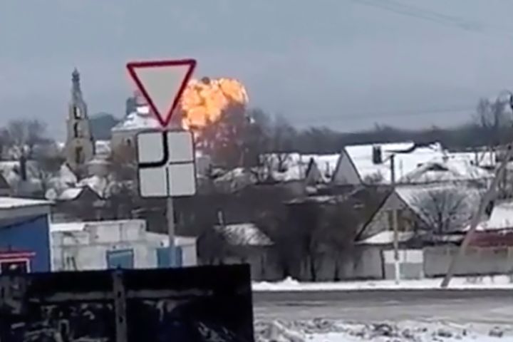 In this handout photo taken from validated UGC video show flames rising from the scene of a warplane crashed at a residential area near Yablonovo, Belgorod region, Wednesday, Jan. 24, 2024