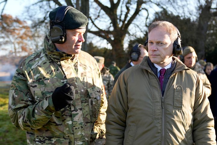 Britain's Chief of the General Staff, General Patrick Sanders (L)talks with Britain's Defence Secretary Grant Shapps during a visit to STANTA training camp in eastern England