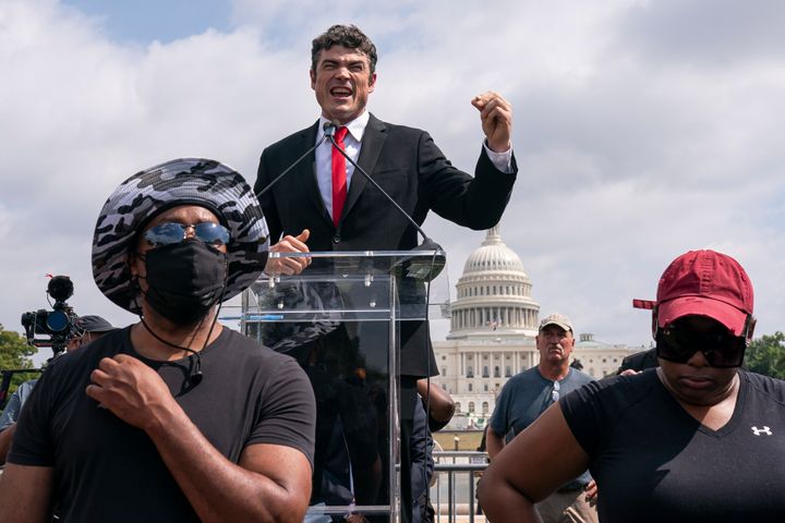 Joe Kent, center, speaks during a "Justice For J6" rally in September 2021, calling for better treatment for those accused of participating in the Jan. 6, 2021, riot at the U.S. Capitol.