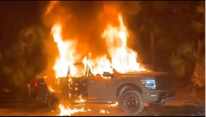 Brian Estep’s pickup truck is seen engulfed in flames, via the Brevard County Sheriff’s Office.