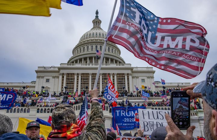 WASHINGTON,DC-JAN6: Supporters of President Trump storm the United States Capitol building. (Photo by Evelyn Hockstein/For The Washington Post via Getty Images)