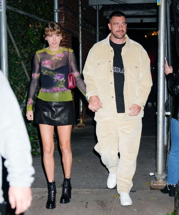 Taylor Swift (left) and Travis Kelce are seen in October last year, in New York City.