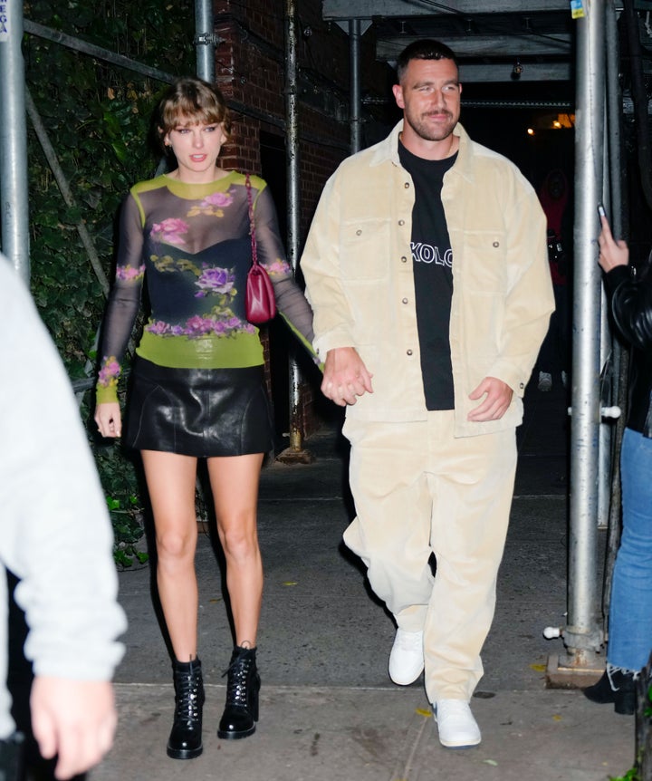 Taylor Swift (left) and Travis Kelce are seen on Oct. 15, 2023, in New York City.