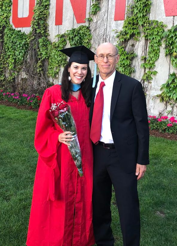 The author and her father at her graduate school graduation in 2019.