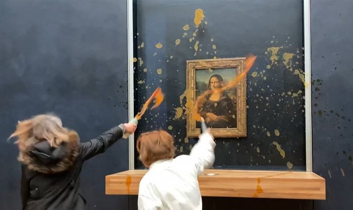Two environmental activists hurl soup at Leonardo Da Vinci's "Mona Lisa" at Paris' Louvre on January 28, 2024.