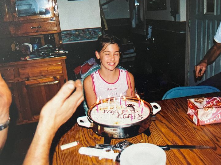 The author celebrates her 12th birthday at home in 2004.