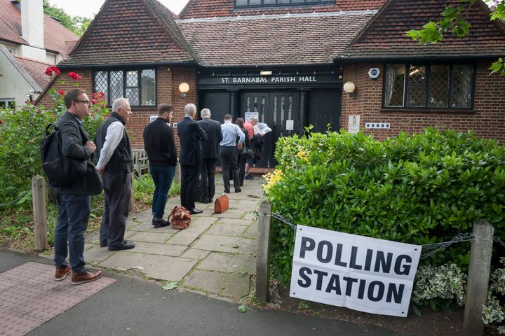 Early voters for the UK 2017 general elections queue